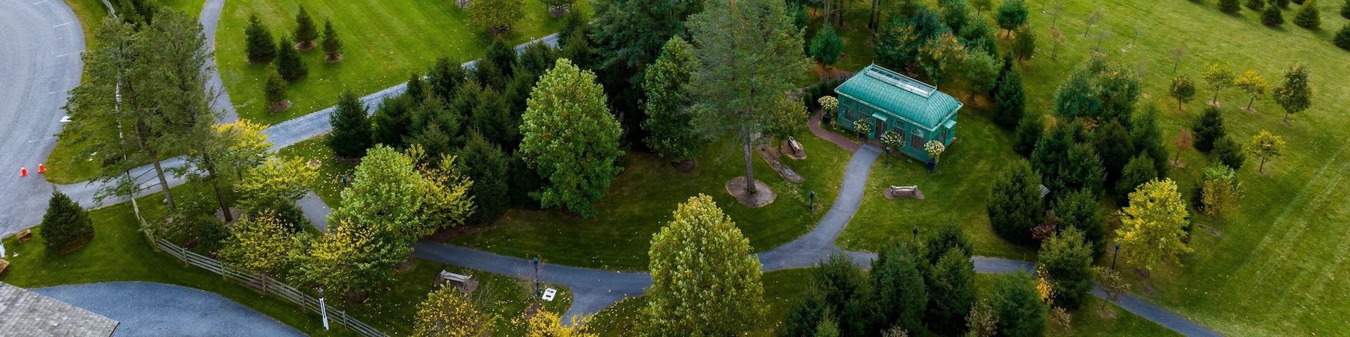 Aerial View of a Large Gazebo in the Middle of a Vineyard, With Seating for a Weddings on an Autumn