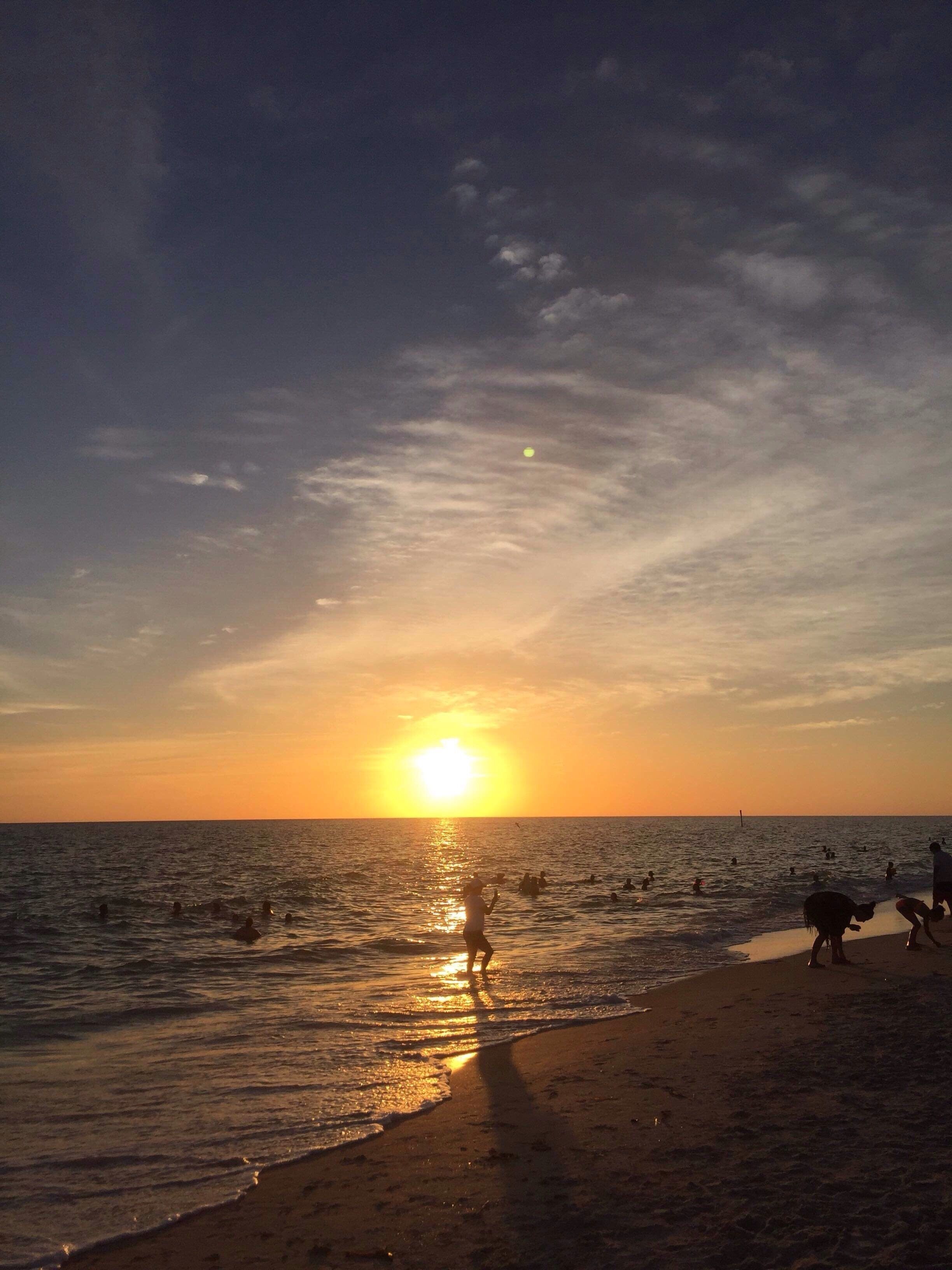 Warm, full of life and beautiful people. Ended our day listening to the drum circle surrounded by kids and familie's