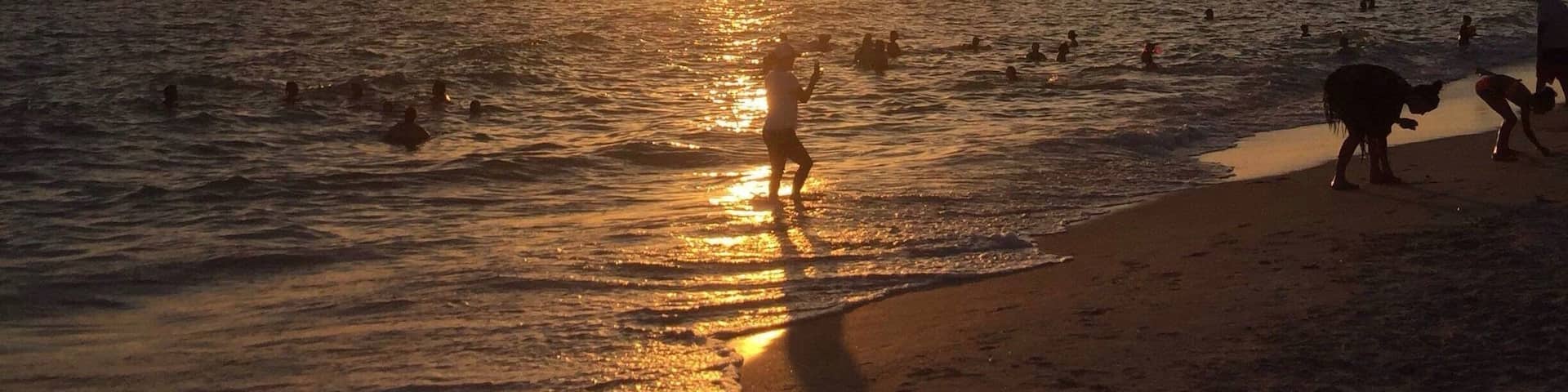 Warm, full of life and beautiful people. Ended our day listening to the drum circle surrounded by kids and familie's