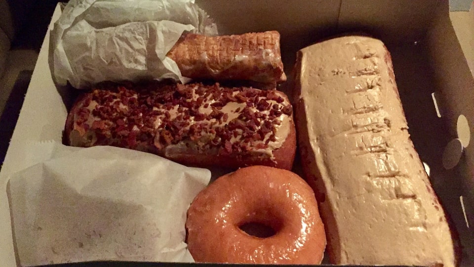 #foodiefinds The take home from my previous picture. Maple Bar, Bacon Maple Bar, old Fashioned, donut holes and cream filled roll.