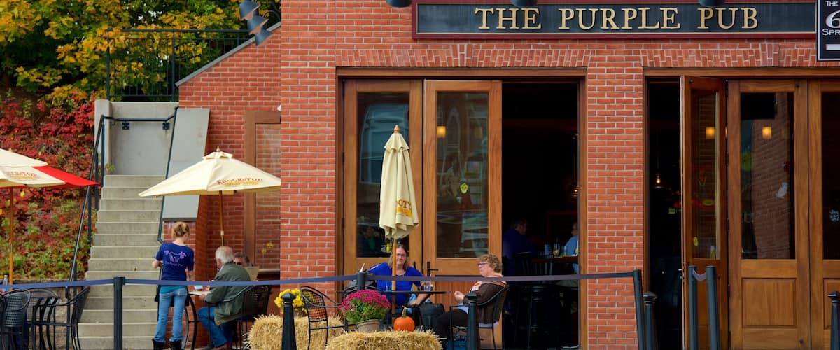 The Purple Pub with outdoor seating and autumn foliage.