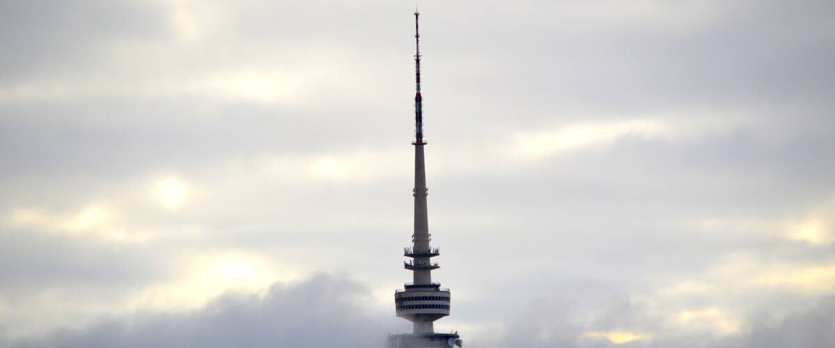 REACHING NEW HEIGHTS … THE TELSTRA TOWER
The Telstra Tower is seen all around Canberra but is it worth going there? We thought so.
It is something to do just once and perhaps best to pick a day which is clear blue skies, little to no wind and no rain.
Located at the top of Black Mountain Reserve, the drive itself is lovely even a bit hairy at times. You see, Canberrians are extremely healthy people, they love their bicycles and that’s great. However, on a windy steep road lined with bush on each side, wildlife, flora and fauna and spectacular views, it’s hard to take note of all these things as you are dodging these healthy but crazy cyclists.
At the top, there is plenty of parking and the Telstra Tower stands proud.
There is an entry fee and a family ticket is just $17. Once you have paid, head through the turnstiles to the lifts which will take you to the enclosed viewing platform some 870 metres above sea level.
There you will discover 360o panoramic views over Canberra and beyond. Another quirky edition is the red vintage post box. There is a café and plenty of seating.
If you are feeling adventurous, head up the stairs to the 1st outdoor level with the same views but this time no glass blocking the view and there is another level above that. Only recommended when no rain and slight wind.
When we were there, it was an overcast day but it was a nice experience all the same.