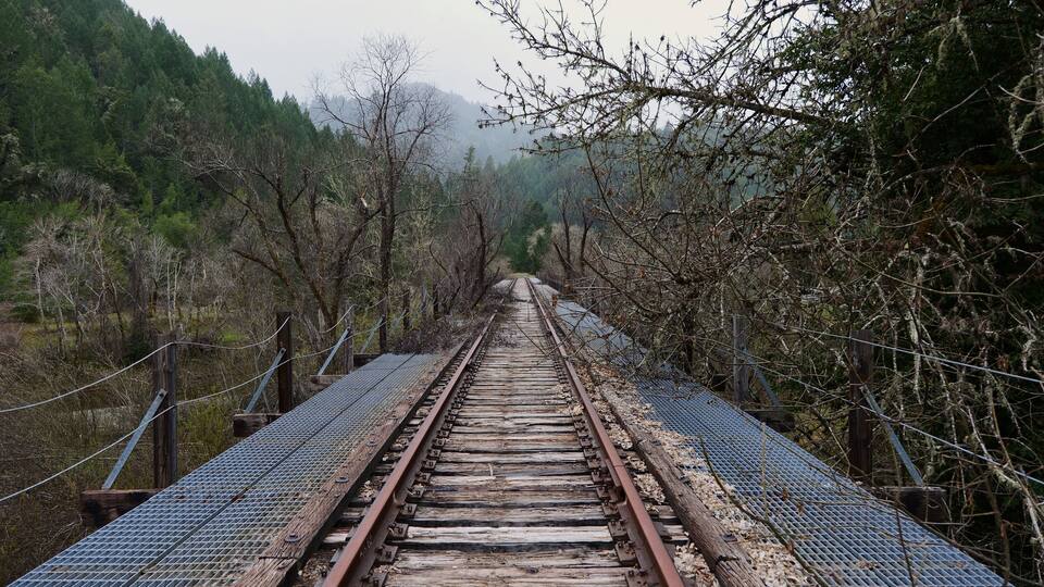 Old abandoned train tracks on bridge near Willits, CA