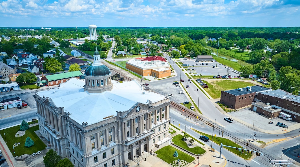 Aerial View of Historic Courthouse in Small Town with Greenery