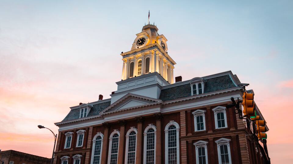 a view of the old courthouse in Indiana PA at sunset