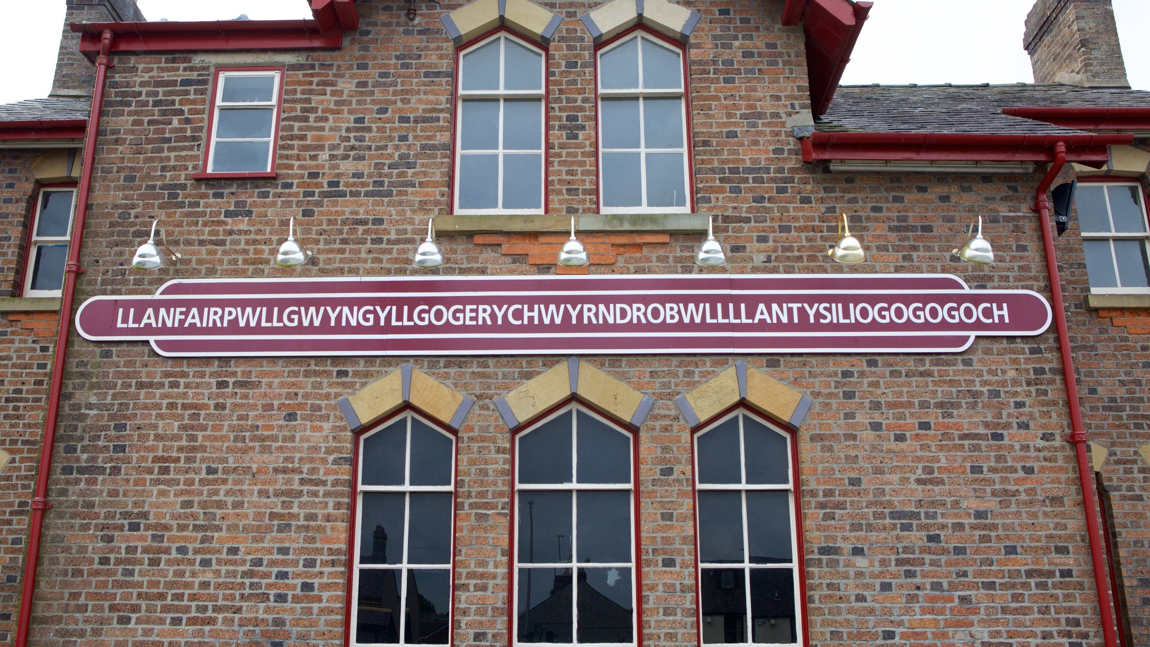 Isle of Anglesey showing signage, heritage elements and a house
