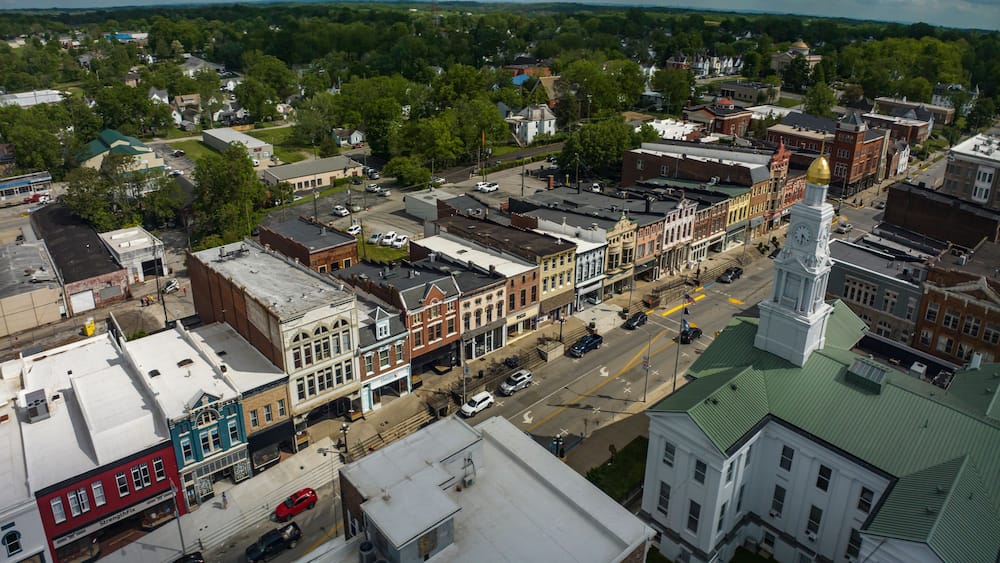 MAY 9, 2023 - WINCHESTER, KENTUCKY - aerial view of historic small town of Winchester with Town Clocktower and historic storefronts and buildings