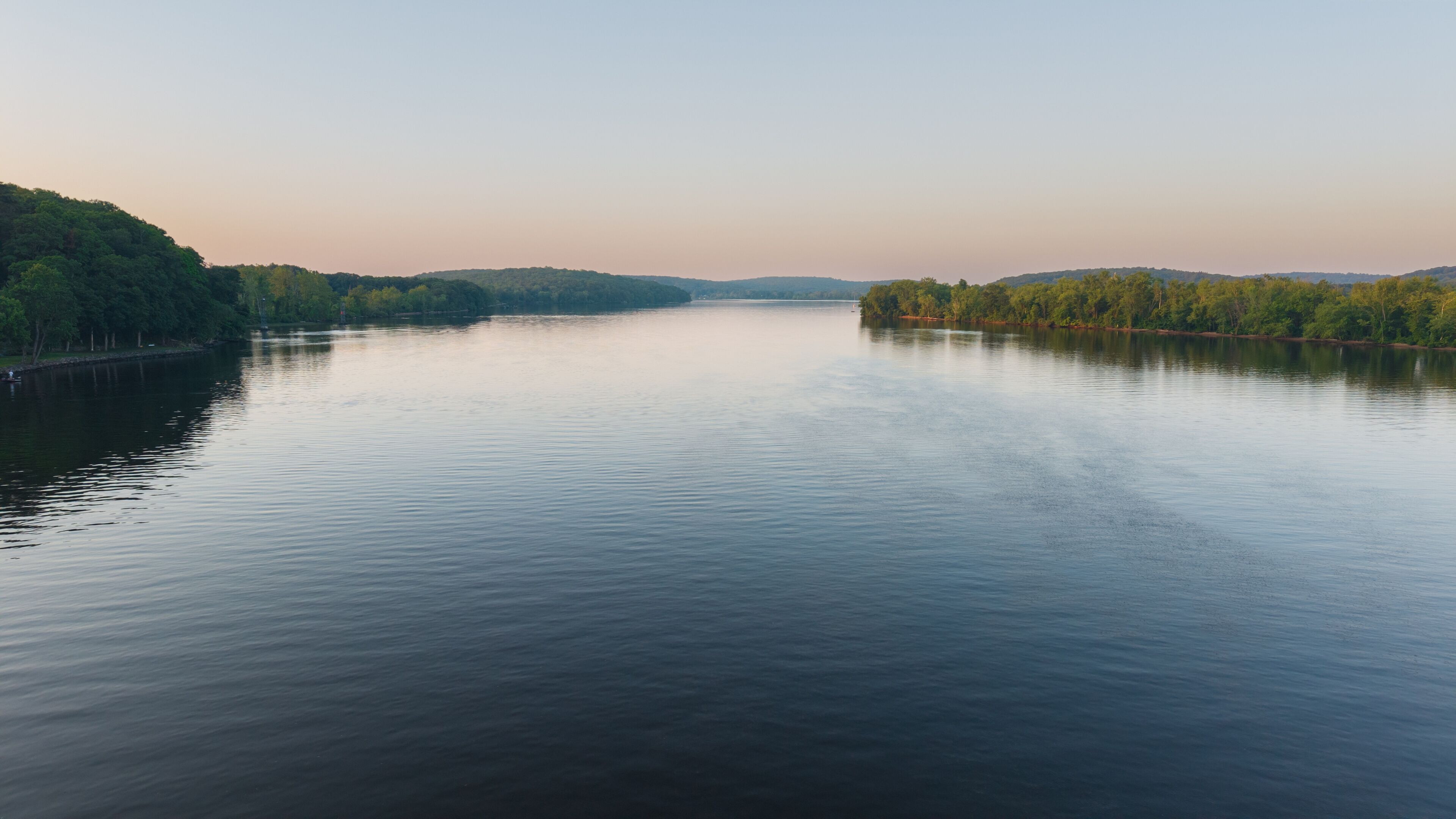 Summer aerial view featuring the Connecticut River at sunrise, between East Haddam and Chester