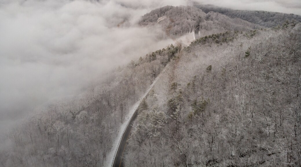 Aerial View of Winding North Carolina Mountain Road in the Snow