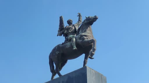 A bronze equestrian statue on a pedestal.