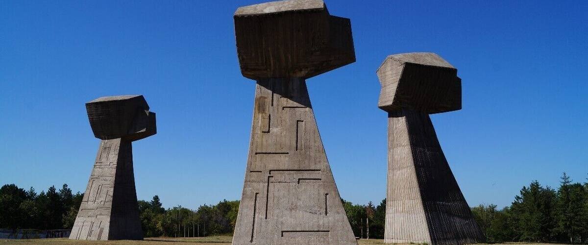 Bubanj is a striking memorial in the town of Niš, in Serbia. The hill was the setting for the execution of more than 10,000 people from Niš. The Germans had a concentration camp near by and brought the prisoners here to be shot during World War II. Trenches were dug to hide the bodies, but they were later dug up and burnt to hide any evidence of the killings.
You can catch a bus (#4) here, but I recommend a taxi.