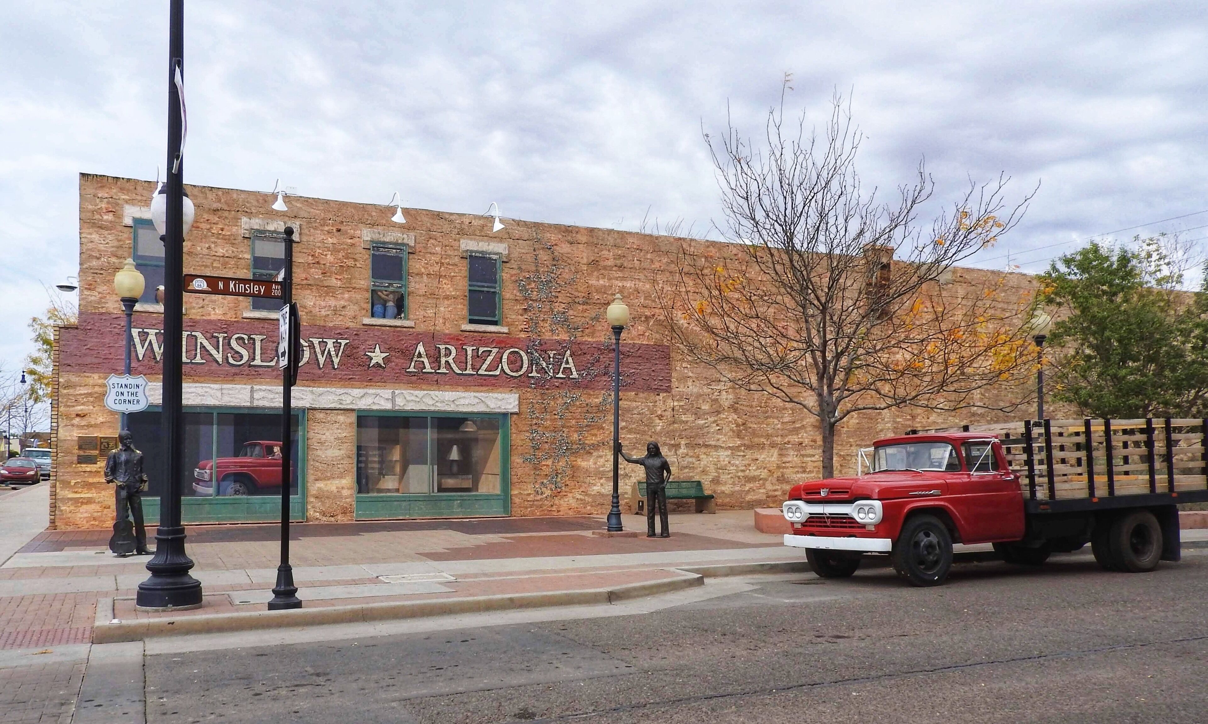 Standin' on the Corner Park is a public park in Winslow, Arizona, opened in 1999, commemorating the song "Take It Easy" which was written by Jackson Browne and Glenn Frey and most famously recorded by the Eagles. The song includes the verse "Well, I'm a standing on a corner in Winslow, Arizona and such a fine sight to see. It's a girl, my Lord, in a flatbed Ford slowin' down to take a look at me." In September 2016, a statue (middle of the pic) was unveiled at the park in the likeness of Glenn Frey, who died earlier that year. (October 2016)

#Trovember