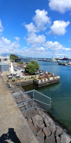 Marina de Ponta Delgada. Here you will find all kinds of restaurants, snack bars, gift shops, the smell of the ocean and much more.