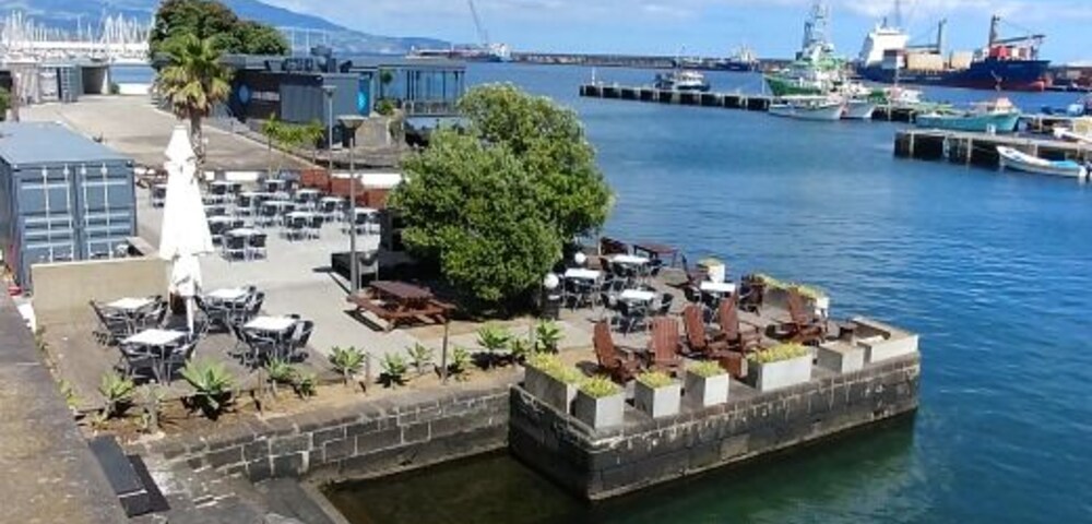 Marina de Ponta Delgada. Here you will find all kinds of restaurants, snack bars, gift shops, the smell of the ocean and much more.