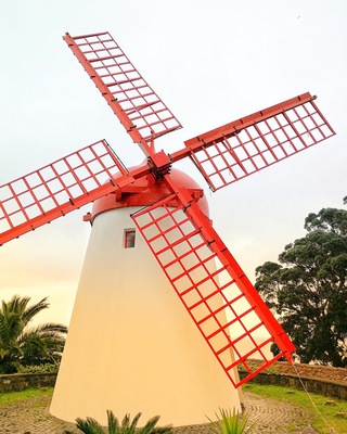 When you are stuck in the middle of the Atlantic ocean, in a windswept location, with limited fuel resources on land, it stands to reason that you will look to the wind (and the surrounding water) as an energy source.
Windmills were brought to the Azores by the Flemish and used for the production of cereals. 20 windmills remain today, on seven of the nine Azorean islands.
The only windmill on SĂŁo Miguel that is still maintained and still works is this one, located just off the E1-1A on the northwestern tip of the island.
If you love finding unique and unusual sights when you travel then this photo spot is for you đ·
Read my full post about how to seek out the best photo spots on SĂŁo Miguel here:
https://galloparoundtheglobe.com/how-to-seek-out-the-best-photo-spots-on-sao-miguel-the-azores/