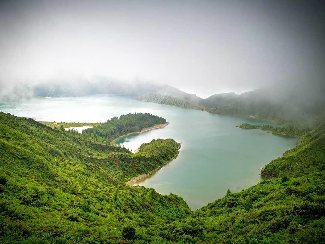 Lagoa do Fogo is a crater lake within the Água de Pau Massif stratovolcano in the center of the island of São Miguel in the Portuguese archipelago of the Azores.
