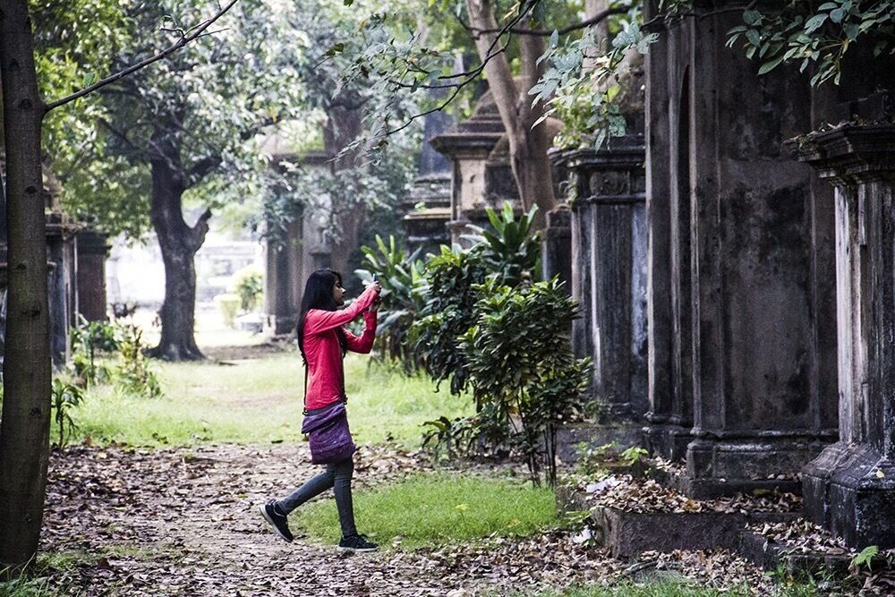 The girl in the red dress! Amazing 18th century cemetery in the heart of Calcutta. Totally secluded and vacuumed from the happening world right outside the gates. 