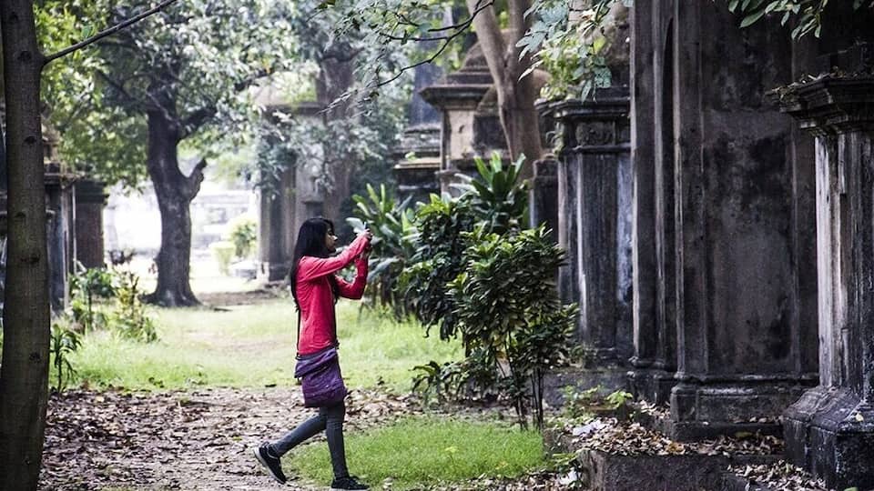 The girl in the red dress! Amazing 18th century cemetery in the heart of Calcutta. Totally secluded and vacuumed from the happening world right outside the gates.