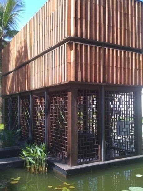 #troveon a modern submerged gazebo within a lotus pond. 