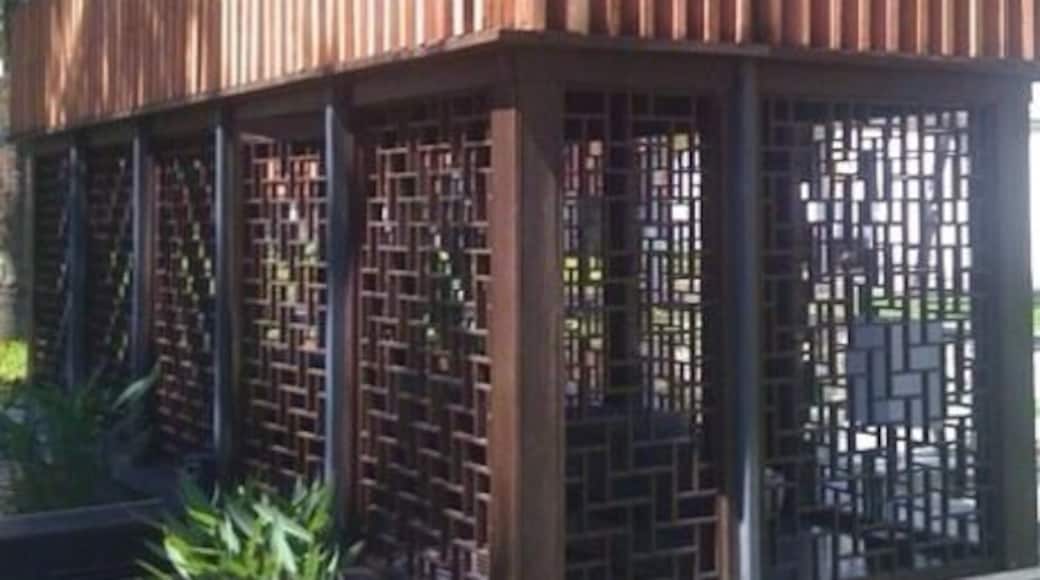 #troveon a modern submerged gazebo within a lotus pond.