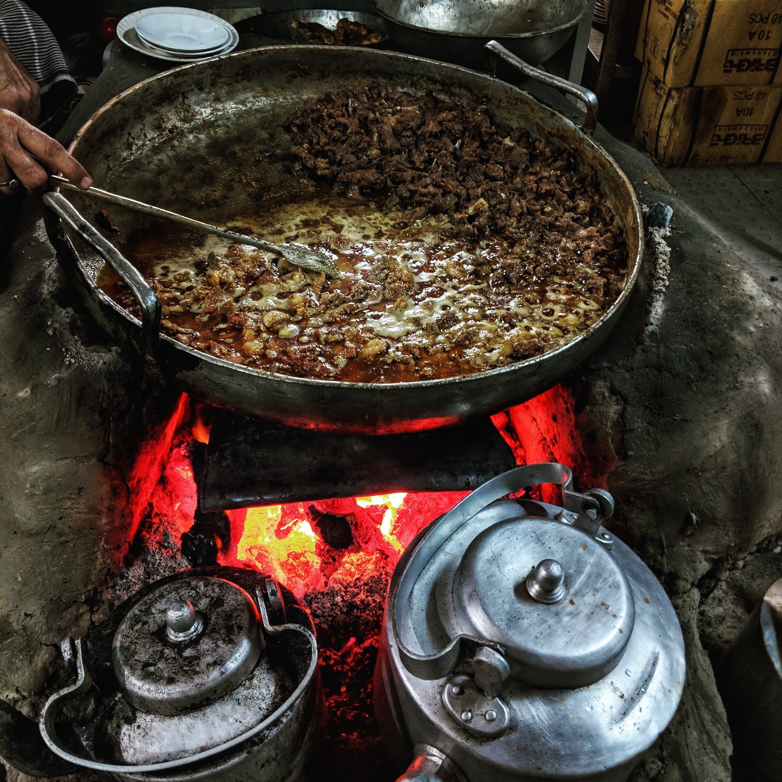 Very few places can maintain the consistency in their quality of food for more than a century. One such place is this one which not only gave #kolkata many of its firsts, but also ensured that clients stay addicted to their food. The famed mutton chaap, first made by them, is being cooked in their kitchen in slow charcoal fire #GoodEats