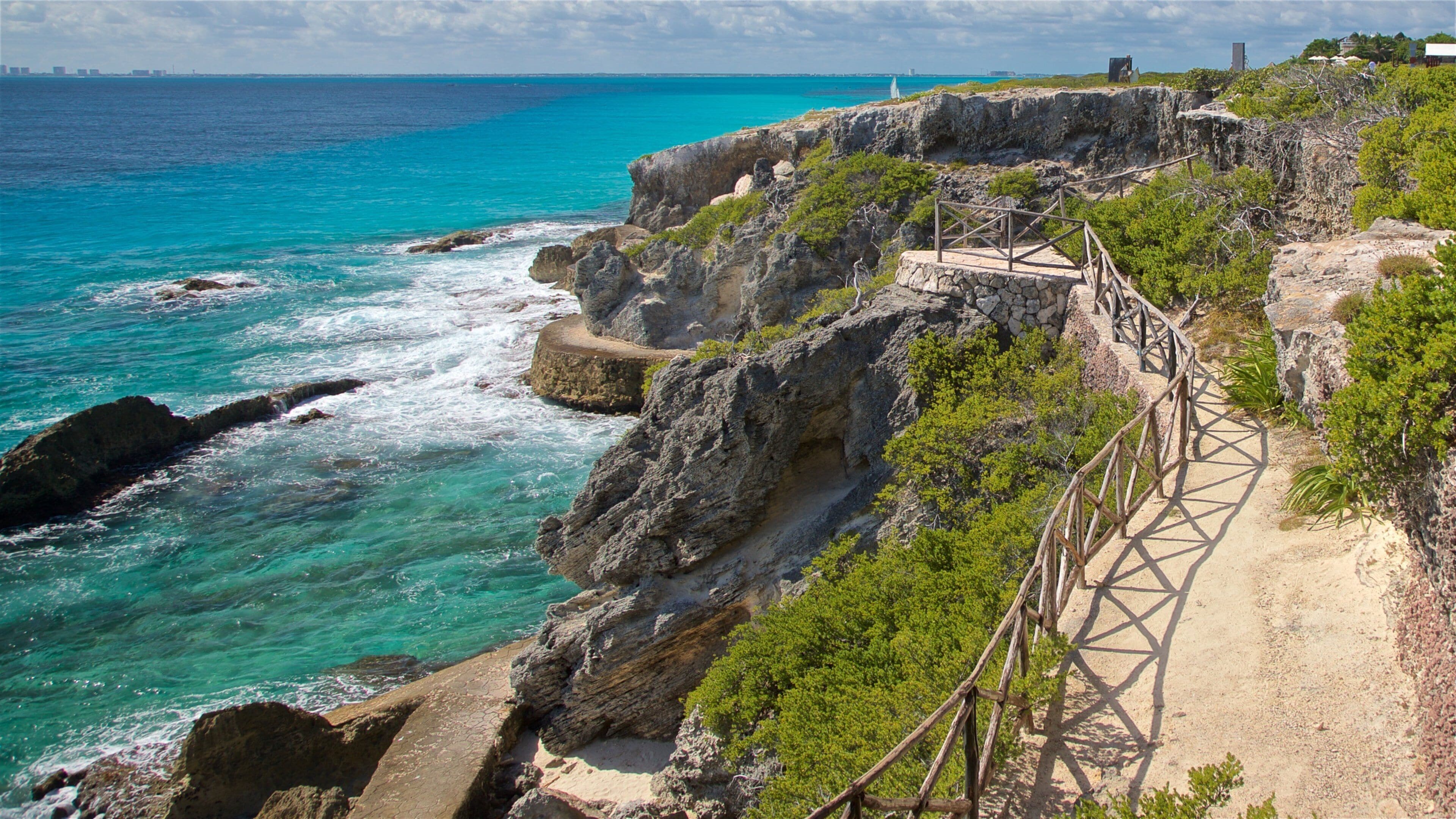Isla Mujeres which includes general coastal views and rocky coastline