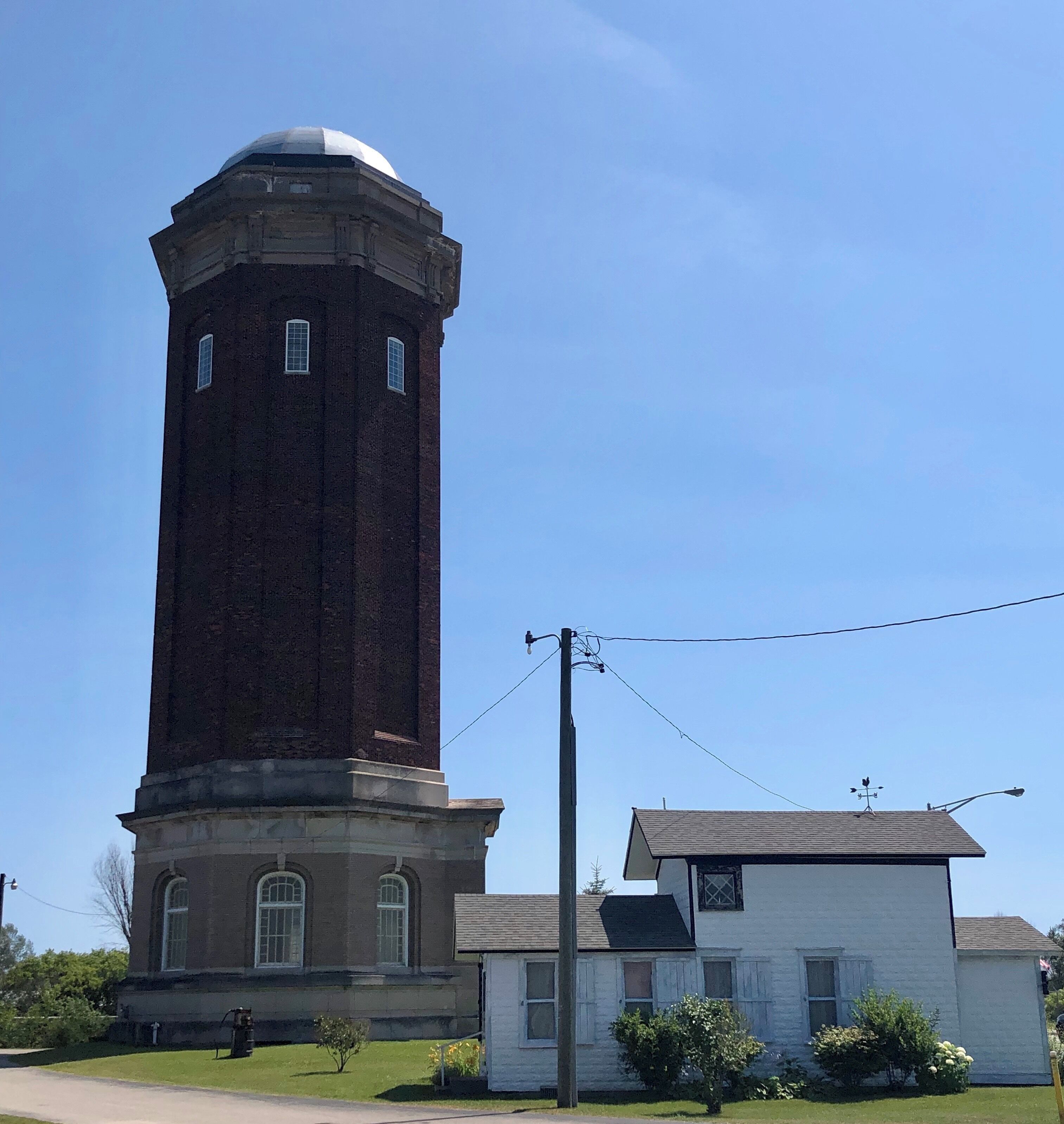 Built in 1922 at a cost of $62,450 this 200 foot octagonal brick tower is a local landmark. It has a 200,000 gallon capacity but is no longer in use. It is part of a historical park in the central district of Manistique.