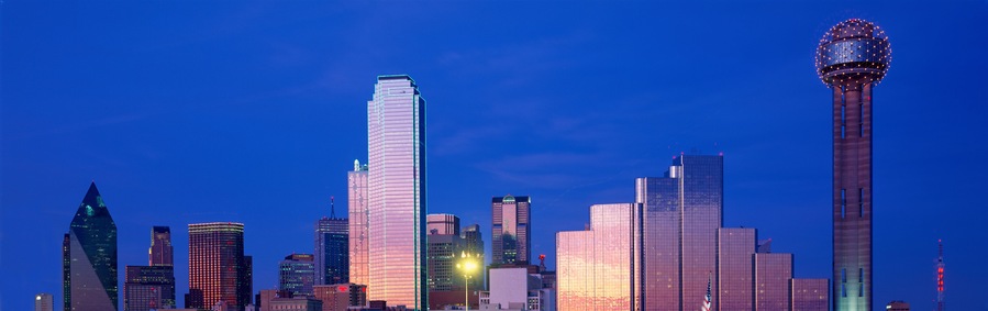 Panoramic View of Dallas, TX skyline at night with Reunion Tower