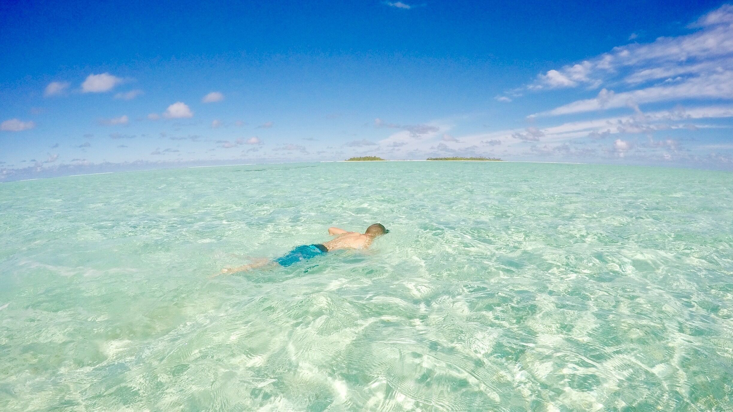 My boy swimming in the shallow lagoon. The lagoon is like a giant swimming pool!