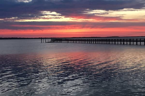 Sunset over the pier in Dunedin