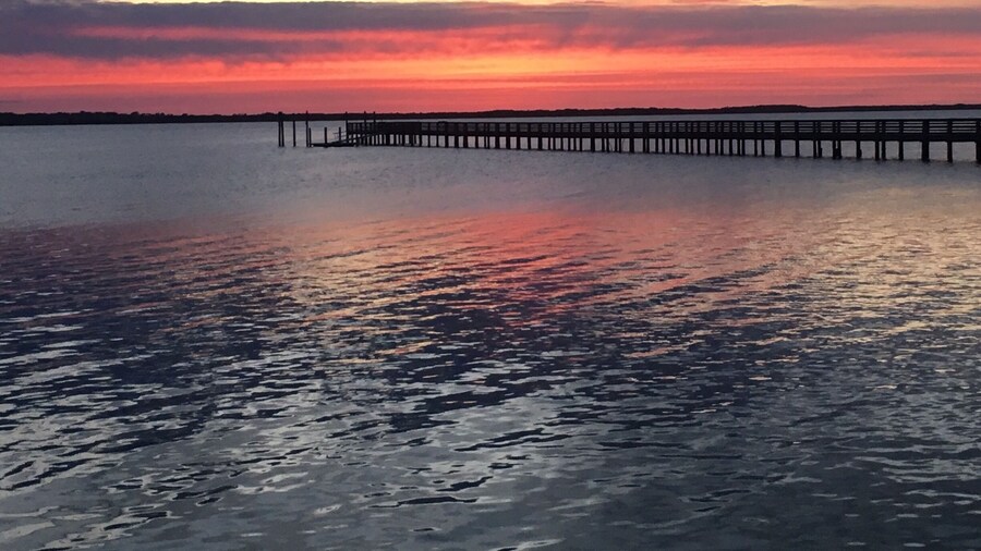 Sunset over the pier in Dunedin