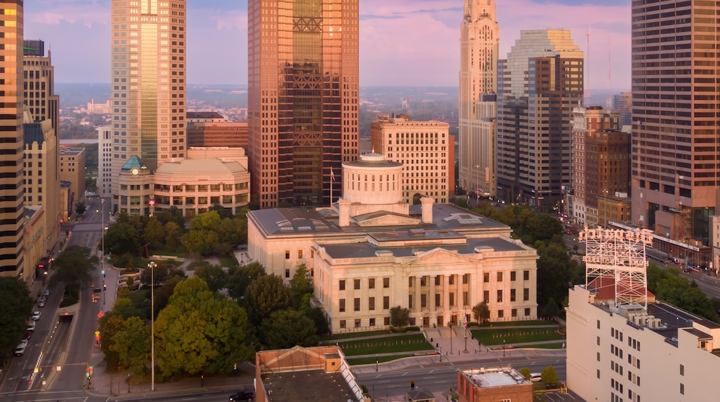 Sunrise over downtown Columbus, OH. Iconic buildings, including the Ohio Statehouse, at dawn. Cityscape. OHIO STATEHOUSE, COLUMBUS, OHIO, UNITED STATES