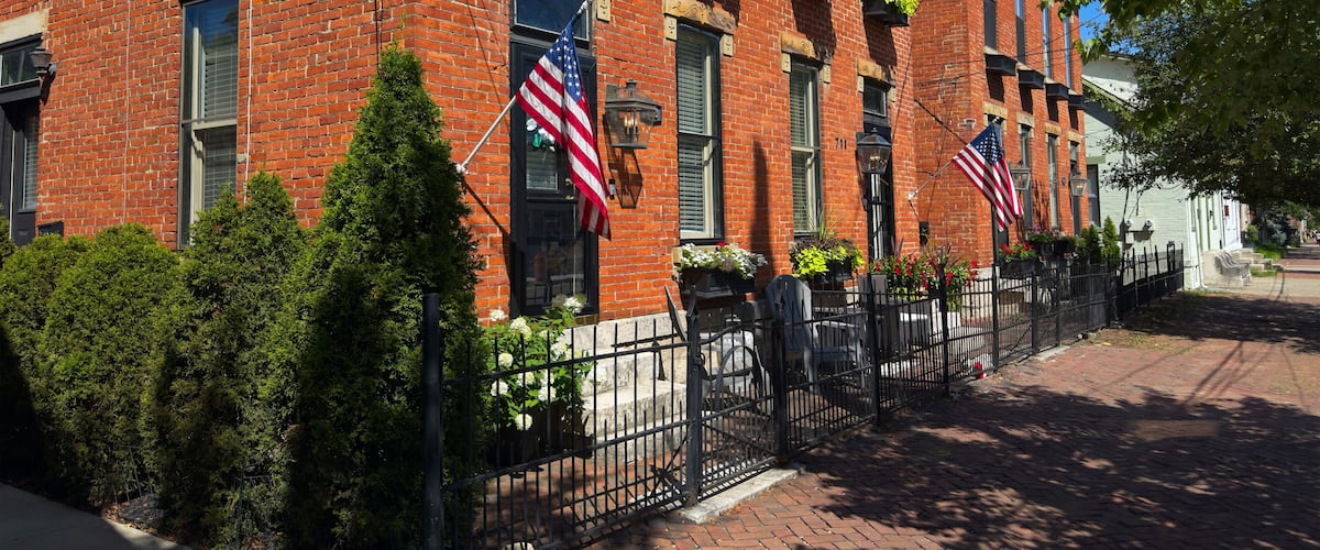 Old residential buildings along brick sidewalks maintain an old world charm in German Village, a uniquely preserved neighborhood of Columbus, Ohio