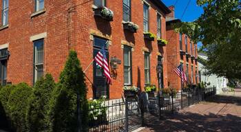 Old residential buildings along brick sidewalks maintain an old world charm in German Village, a uniquely preserved neighborhood of Columbus, Ohio