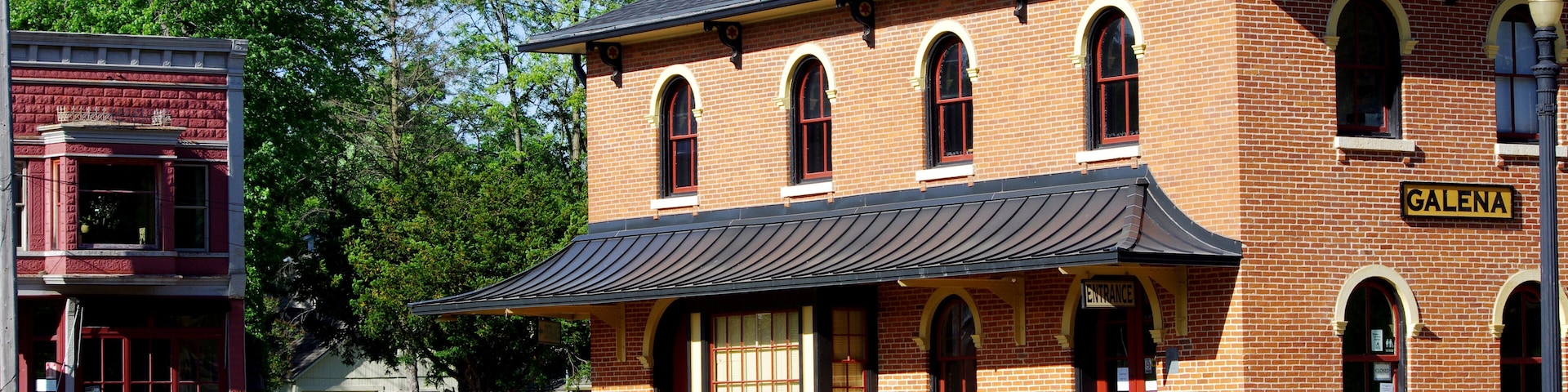 Beautifully renovated railway station and general store across the way in historic Helena IL.