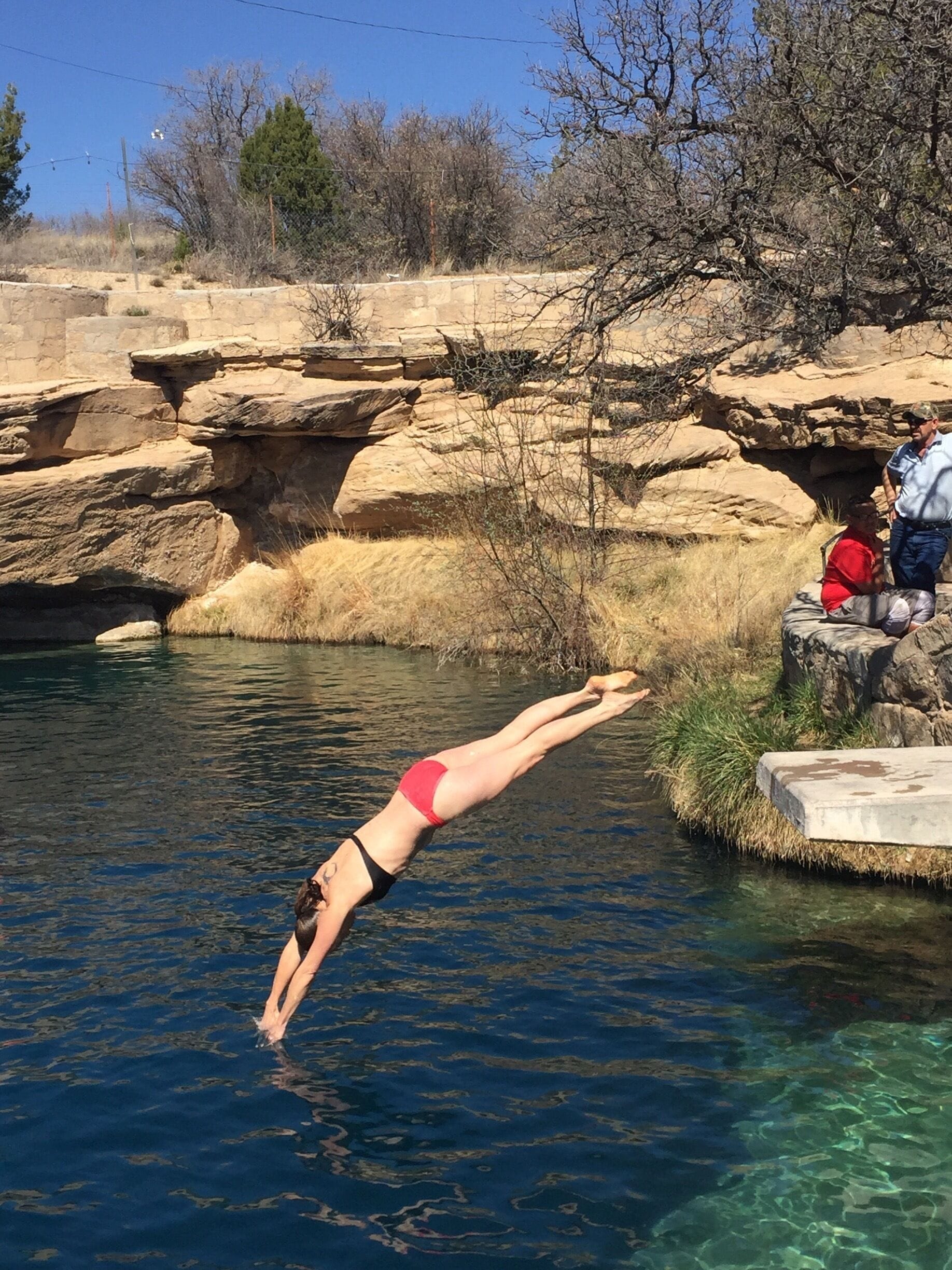 The dive into Blue Hole can take your breath away; not recommended for weak swimmers. I liken this experience to a delightful slap in the face. 😉 The cement platform provides one of many jumping-off points into this icy pond. 