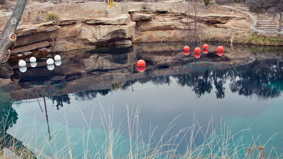 SANTA ROSA, NM, USA - March 11 ,2019. At 80 feet deep with clear blue water, the Blue Hole on Route 66 in Santa Rosa, NM.