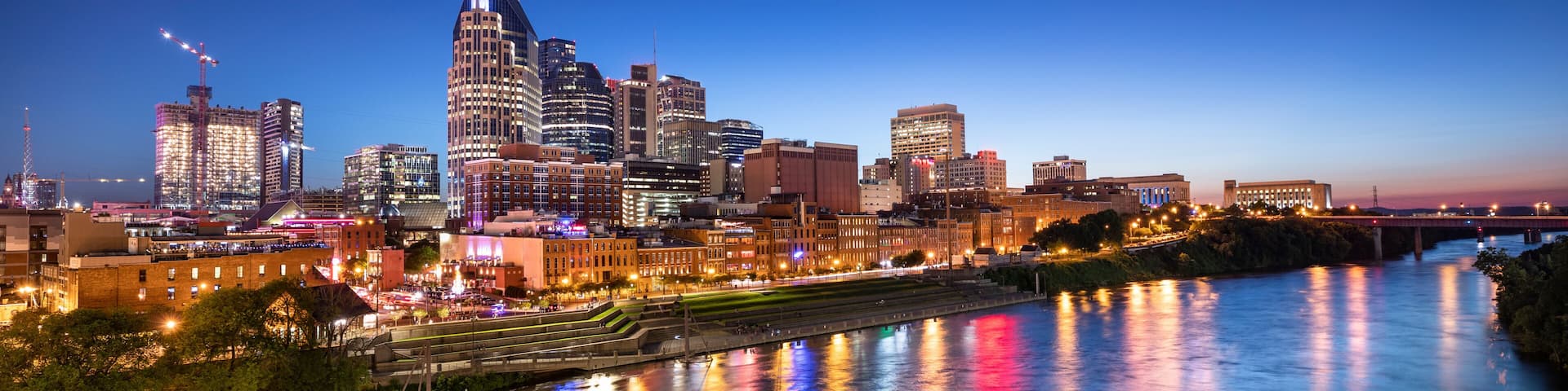 City of Nashville Tennessee at night on the Cumberland River in Tennessee USA