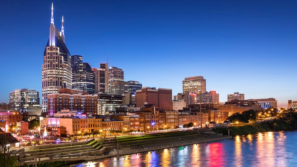 City of Nashville Tennessee at night on the Cumberland River in Tennessee USA