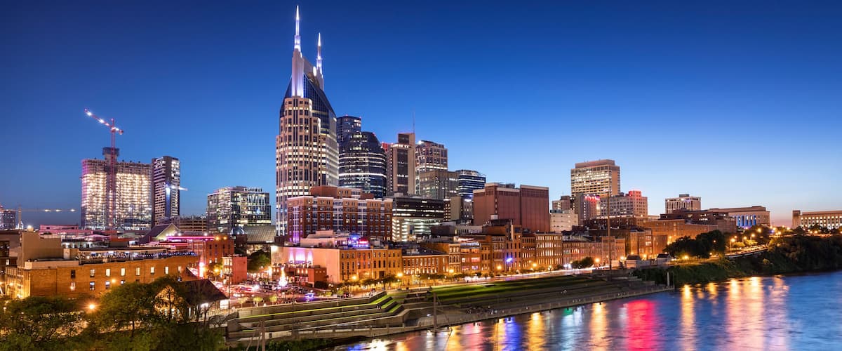 City of Nashville Tennessee at night on the Cumberland River in Tennessee USA
