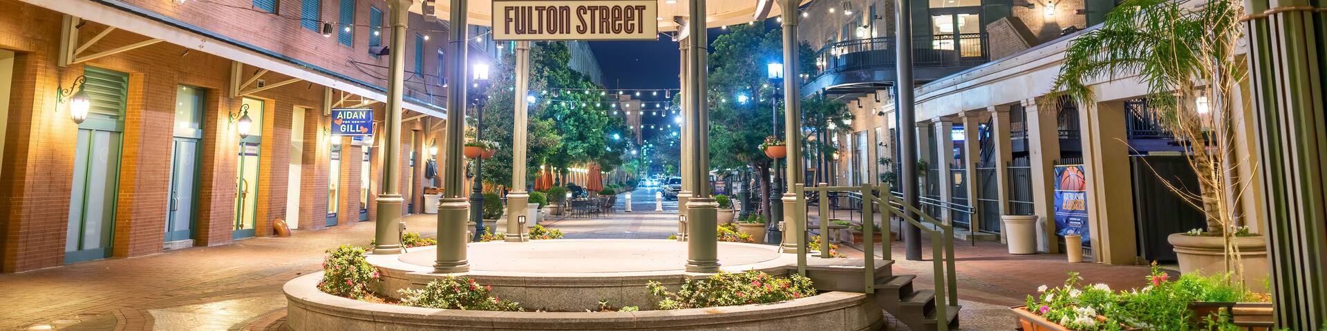 NEW ORLEANS, LA - FEBRUARY 8, 2016: Famous Fulton Street at night