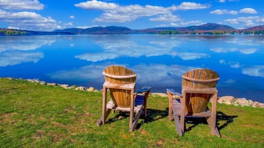 Two chairs on Fourth Lake ( Fulton Chain Lakes ) in the Adirondack Mounations of New York State