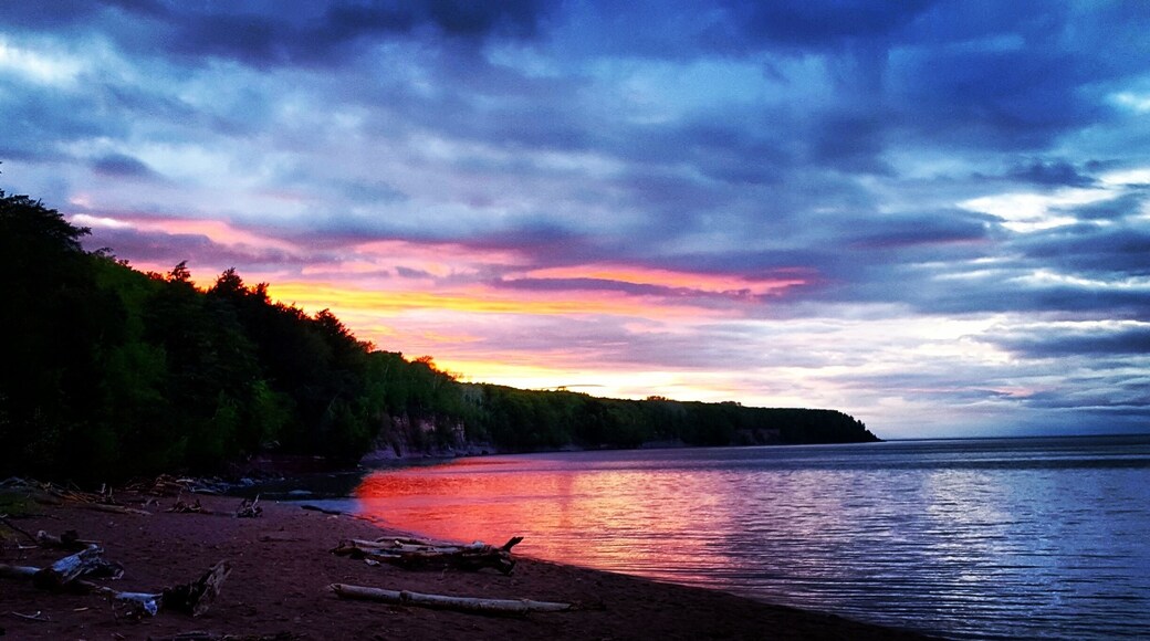 Beach just a little north of Big Bay Michigan near the Harbor! Amazing view!! #michigan #sunset #afterthestorm #beautiful #sky #cliff #lakesuperior