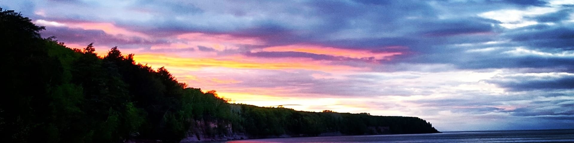 Beach just a little north of Big Bay Michigan near the Harbor! Amazing view!! #michigan #sunset #afterthestorm #beautiful #sky #cliff #lakesuperior