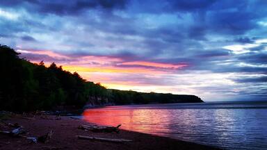 Beach just a little north of Big Bay Michigan near the Harbor! Amazing view!! #michigan #sunset #afterthestorm #beautiful #sky #cliff #lakesuperior