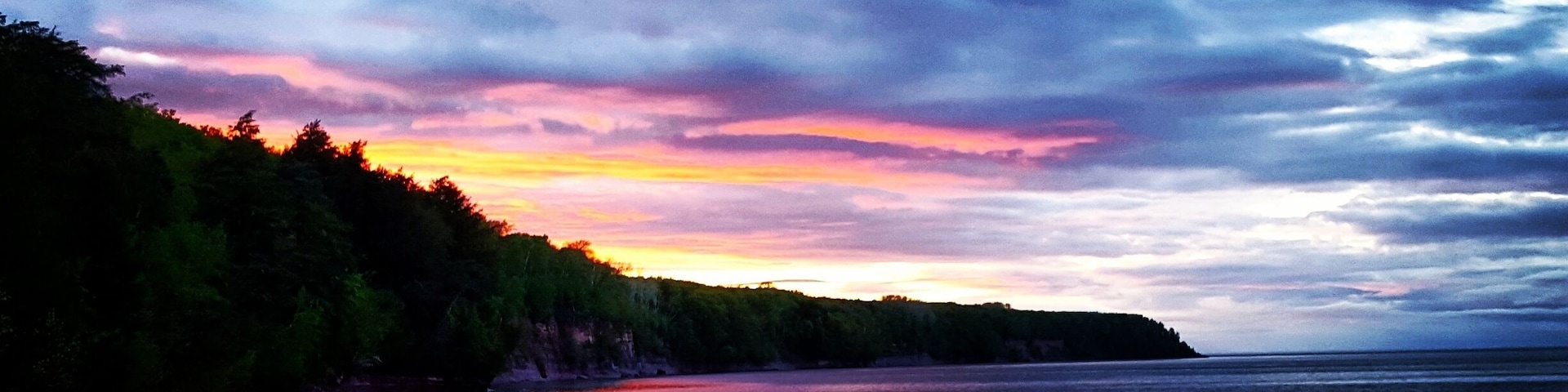 Beach just a little north of Big Bay Michigan near the Harbor! Amazing view!! #michigan #sunset #afterthestorm #beautiful #sky #cliff #lakesuperior