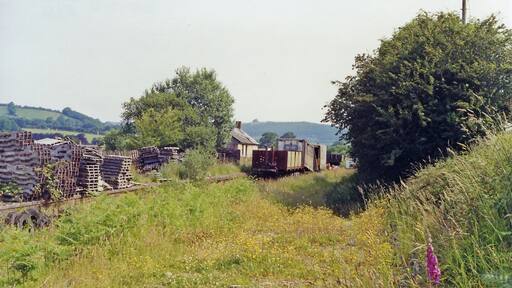 Derry Ormond station (remains), 1992. View SW, towards Carmarthen: ex-GWR Carmarthen - Aberystwyth line. The station and line were closed 22/2/65, although actually, due to flooding, the line was blocked from 14/12/64. The survival of so much nearly 30 years later is remarkable.