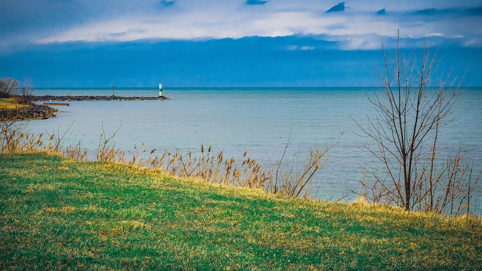 A lighthouse jutting out into Lake Erie in Geneva-On-The-Lake, Ohio
