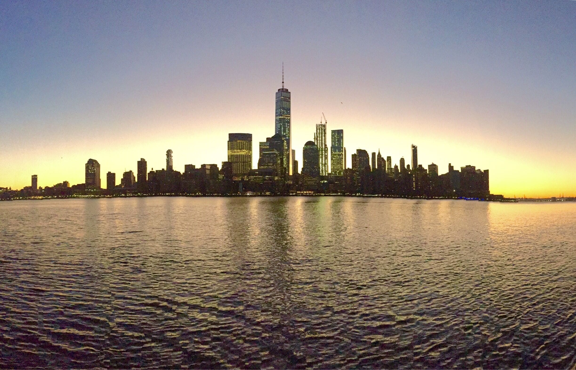 This the view of New York City at dawn from Jersey City. The best place I reckon to take a photo of the New York City skyline (from Jersey side) is from the Hudson River Waterfront Walkway.