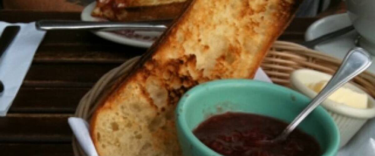 Toasted baguette, jam, butter and coffee - Petit déjeuner des champions.